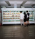 Shanghai Restaurant, 3 people checking the food display
