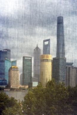 Shanghai Skyline seen from 3 on the Bund through window mash